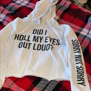 cropped sweater, white w black writing and the back is plain white